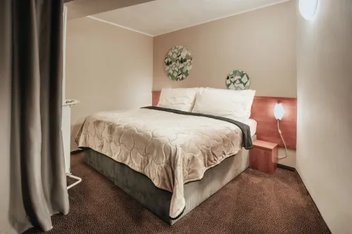 Manželská posteľ v suite standard