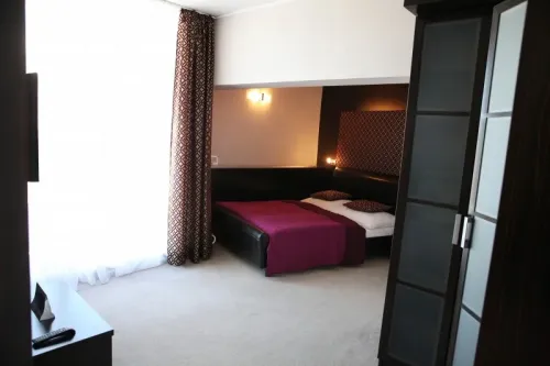 Manželská posteľ v apartmáne standard